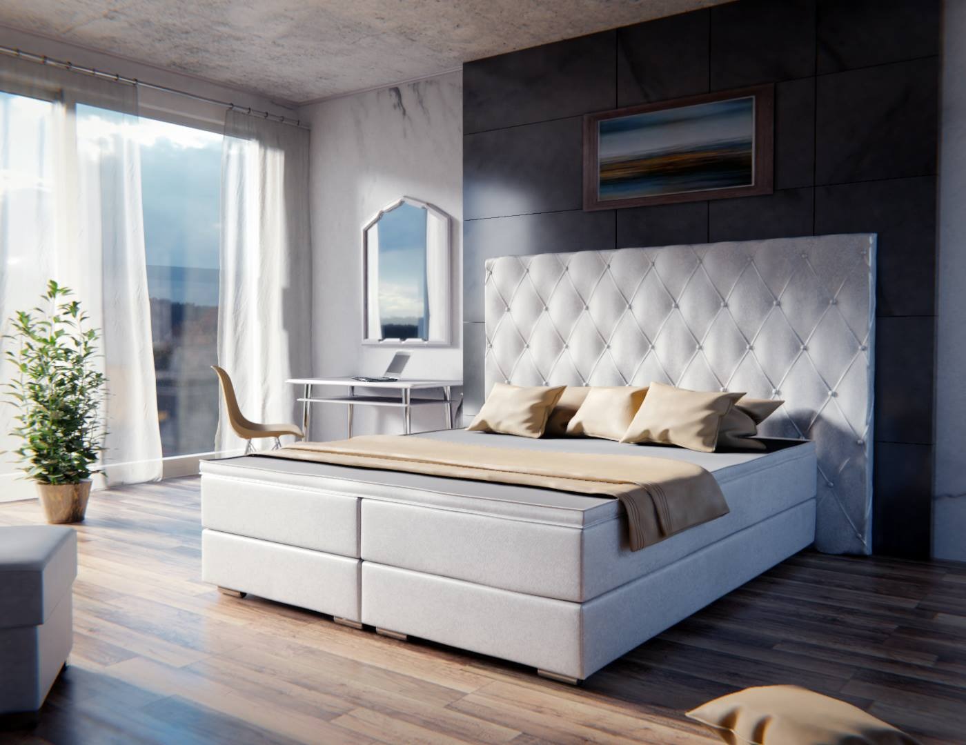 Łóżko kontynentalne z pikowanym zagłówkiem w jasnej sypialni z biurkiem i rośliną doniczkową przy oknie.