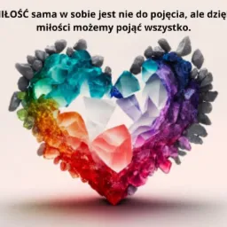 Kryształowe serce w barwach tęczy otoczone szarymi kamieniami, z napisem o miłości