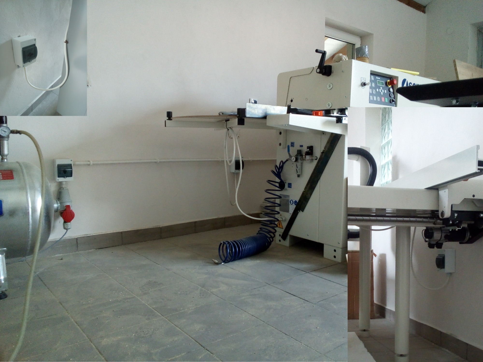 Biała maszyna przemysłowa z podłączonym osprzętem pneumatycznym i elektrycznym, widoczne instalacje elektryczne na ścianie, szara podłoga z płytek.