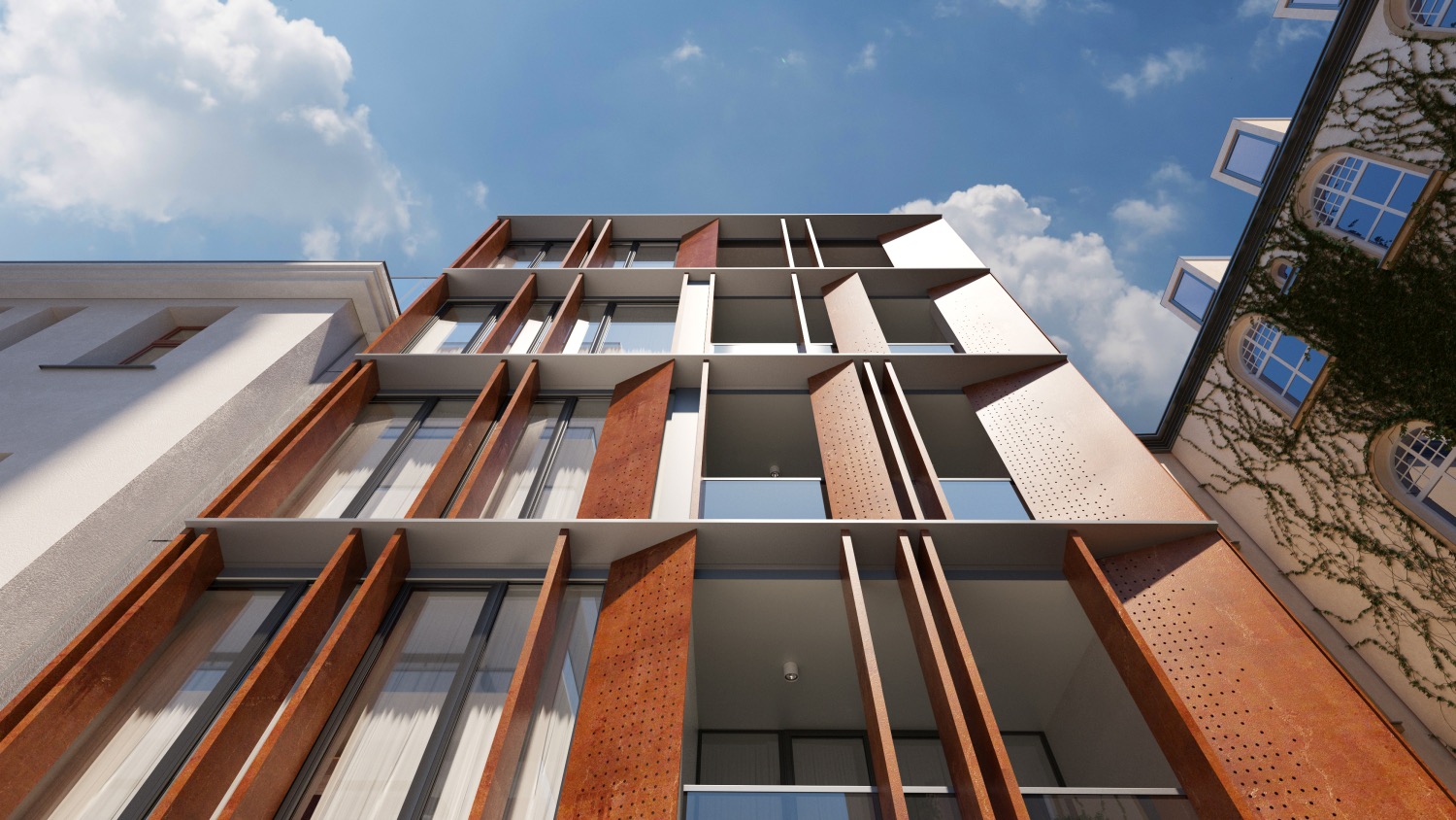 Nowoczesny budynek wielorodzinny z perforowanymi, rdzawymi panelami elewacyjnymi, widok z dołu na błękitne niebo z chmurami, sąsiedni budynek z oknami łukowymi i bluszczem.