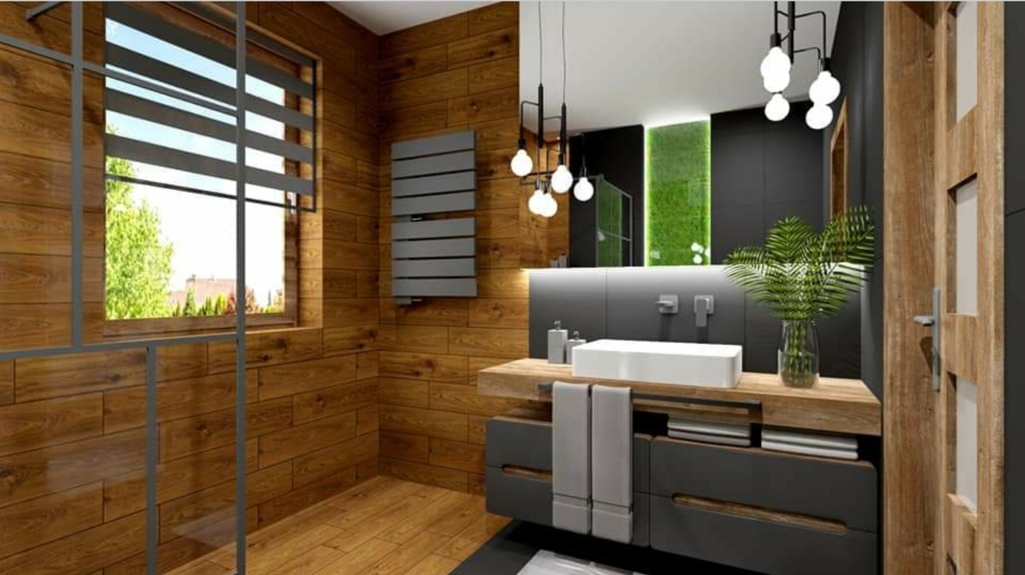 Nowoczesna łazienka z drewnianą boazerią, szarą szafką pod umywalką, lustrem z podświetleniem LED i dekoracyjną ścianą z mchu.