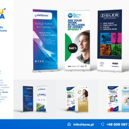 Tuna - studio graficzne - Zestaw roll-upów i standów reklamowych różnych firm, prezentujących różnorodne produkty i usługi, od IT outsourcingu po maszyny dla przemysłu farmaceutycznego, z widocznymi logotypami i hasłami...