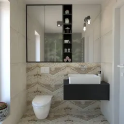 Nowoczesna łazienka z płytkami ułożonymi w jodełkę, białą ceramiką i czarną szafką pod umywalką, uzupełniona o rośliny w dekoracyjnych doniczkach i oświetlenie w stylu industrialnym.