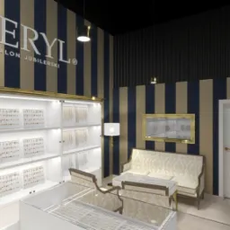 Wizualizacja wnętrza salonu jubilerskiego BERYL z ekspozycją biżuterii w podświetlanych gablotach, sofa z wzorzystą tapicerką i stolik kawowy na tle ścian w pionowe pasy.