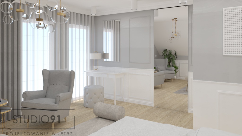 Jasne wnętrze sypialni z szarym fotelem typu uszak, białym biurkiem z lustrem, pufą i lampą ze złotymi elementami. W tle widoczny pokój przez przesuwne szklane drzwi i dekoracyjna lampa sufitowa...