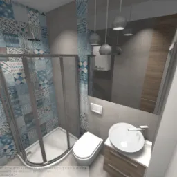 Wizualizacja łazienki z kabiną prysznicową, umywalką nablatową na szafce z szufladami, toaletą i dekoracyjnymi płytkami w odcieniach błękitu i szarości, odbitymi w dużym lustrze.