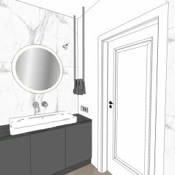 DMD Projekt - Wizualizacja łazienki z okrągłym lustrem podświetlanym LED, umywalką nablatową na szafce w kolorze grafitowym, marmurową okładziną ścian, wieszakiem na ręczniki i białą stolarką drzwiową.