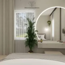 Jasna sypialnia z toaletką podświetloną okrągłym lustrem, widok na okno z zielenią, minimalistyczny wystrój z palmą doniczkową.