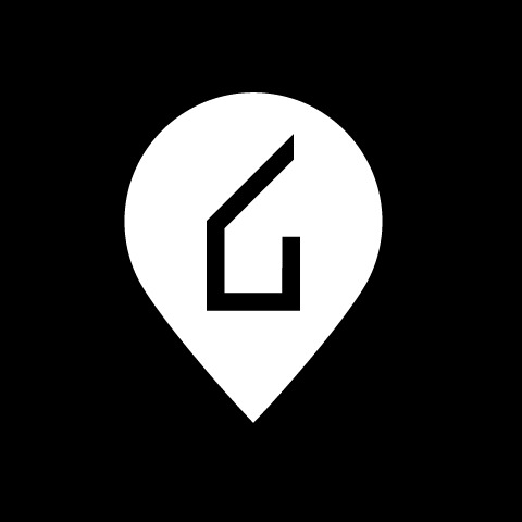 Biały znacznik lokalizacji z symbolem domu wewnątrz, na czarnym tle.