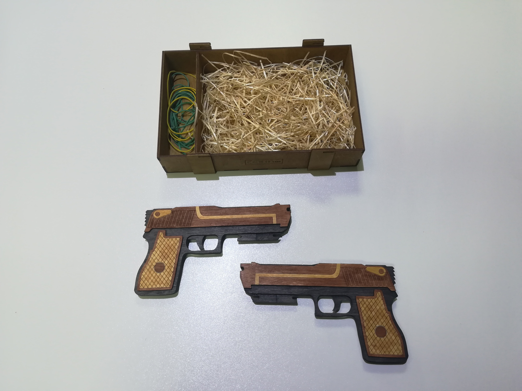 Drewniane pistolety na gumki