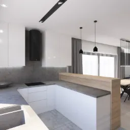 Nowoczesna, minimalistyczna kuchnia z białymi szafkami, szarym blatem i betonowym zlewem, oświetlona wiszącymi lampami i listwą LED, z widokiem na jadalnię z drewnianym stołem i czarnymi krzesłami.