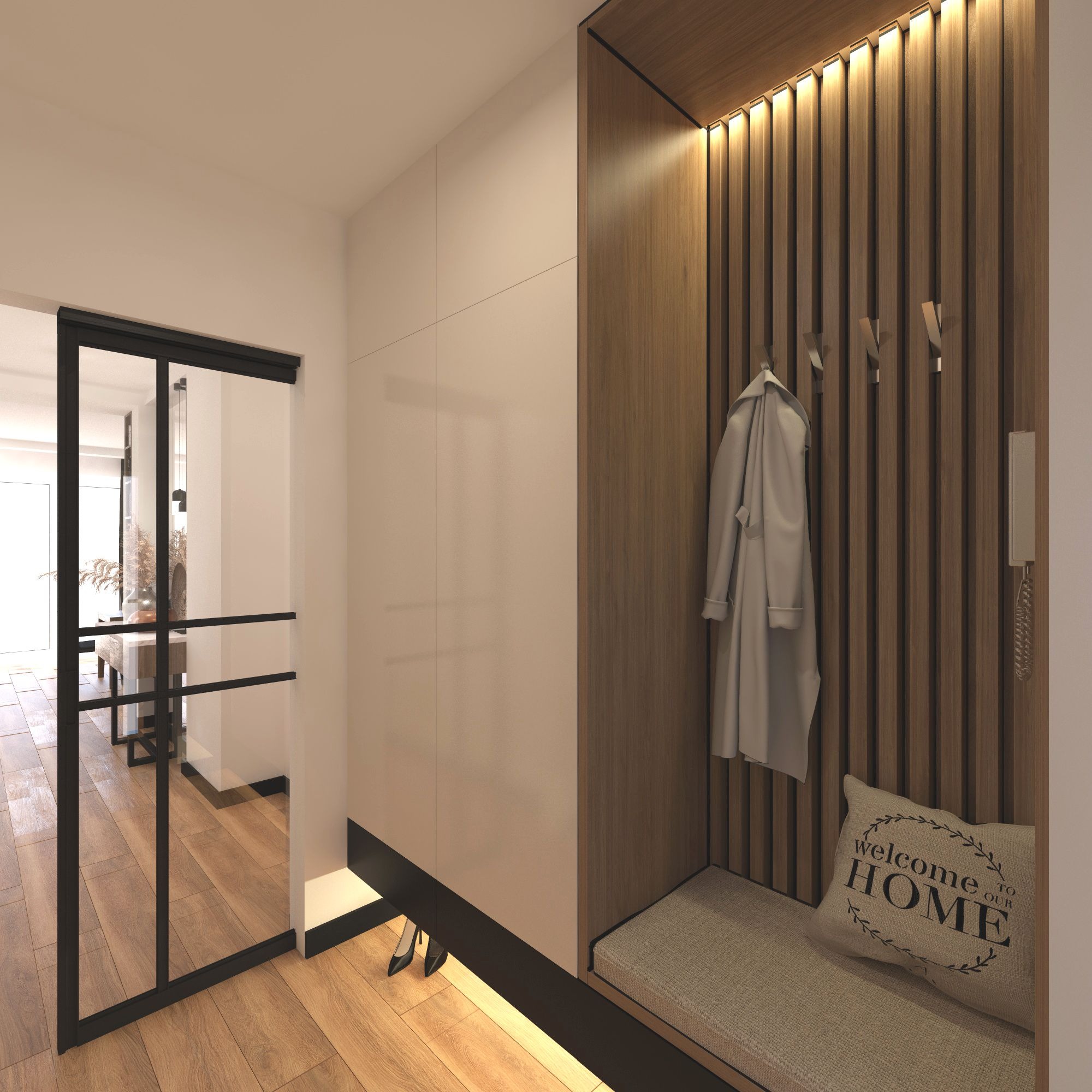 Nowoczesny przedpokój z szafą w zabudowie, drewnianym panelem z haczykami na ubrania, siedziskiem z poduszką dekoracyjną i czarną, przeszkloną ścianą działową.