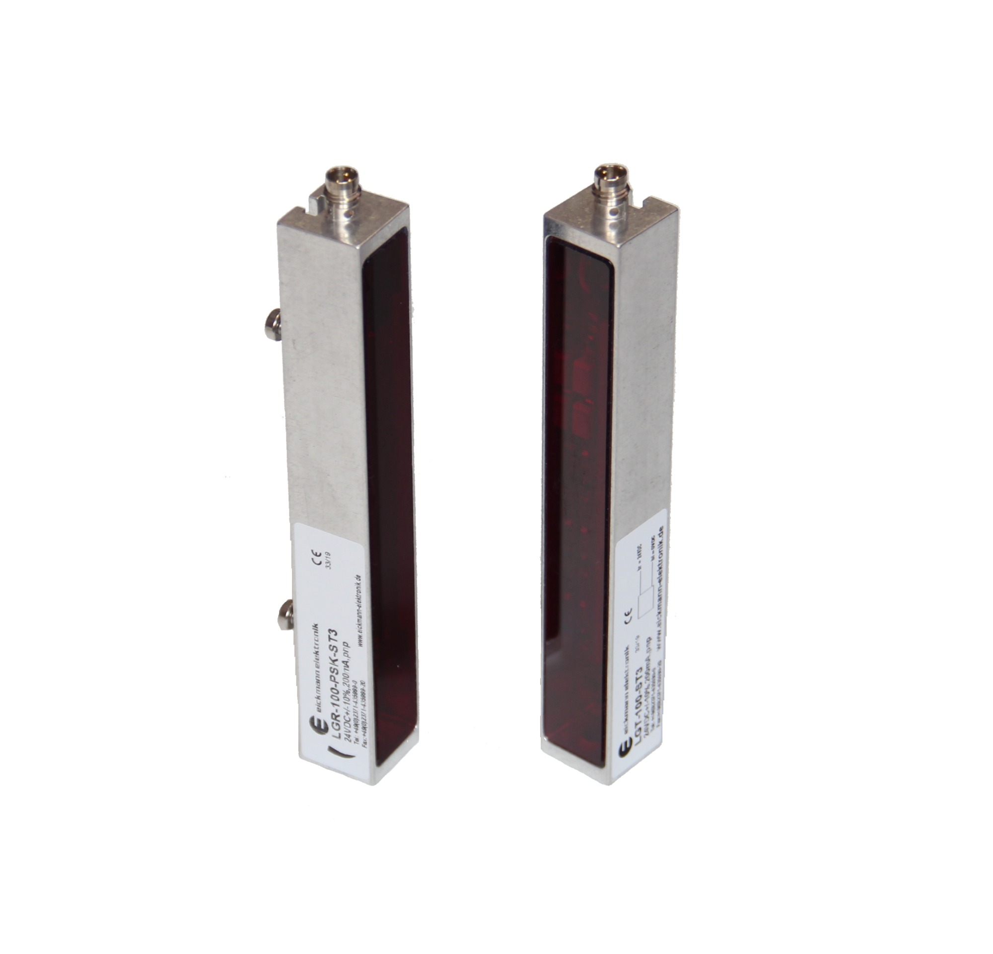 Dwa czujniki optyczne ramkowe, model LGR-100-PSK-ST3 i LGT-100-ST3, firmy eickmann elektronik, widoczne etykiety z parametrami technicznymi.