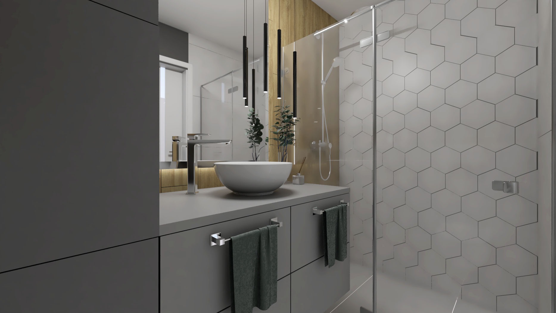 Nowoczesna łazienka z umywalką nablatową, szarą szafką pod umywalką, kabiną prysznicową z heksagonalnymi płytkami i wiszącymi lampami tubami.