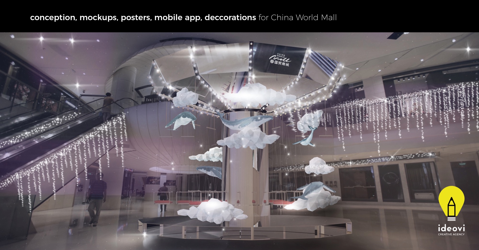 Wnętrze centrum handlowego China World Mall z dekoracją: instalacja z chmur i wielorybów, podwieszona pod sufitem, oświetlona girlandami światełek.