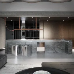 Minimalistyczna kuchnia z marmurową wyspą, srebrnymi stołkami barowymi i oświetleniem punktowym, widok z salonu.