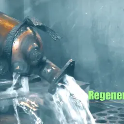 Regeneracja filtra DPF w procesie czyszczenia wodą pod ciśnieniem, widoczne logo firmy DPF Centrum.