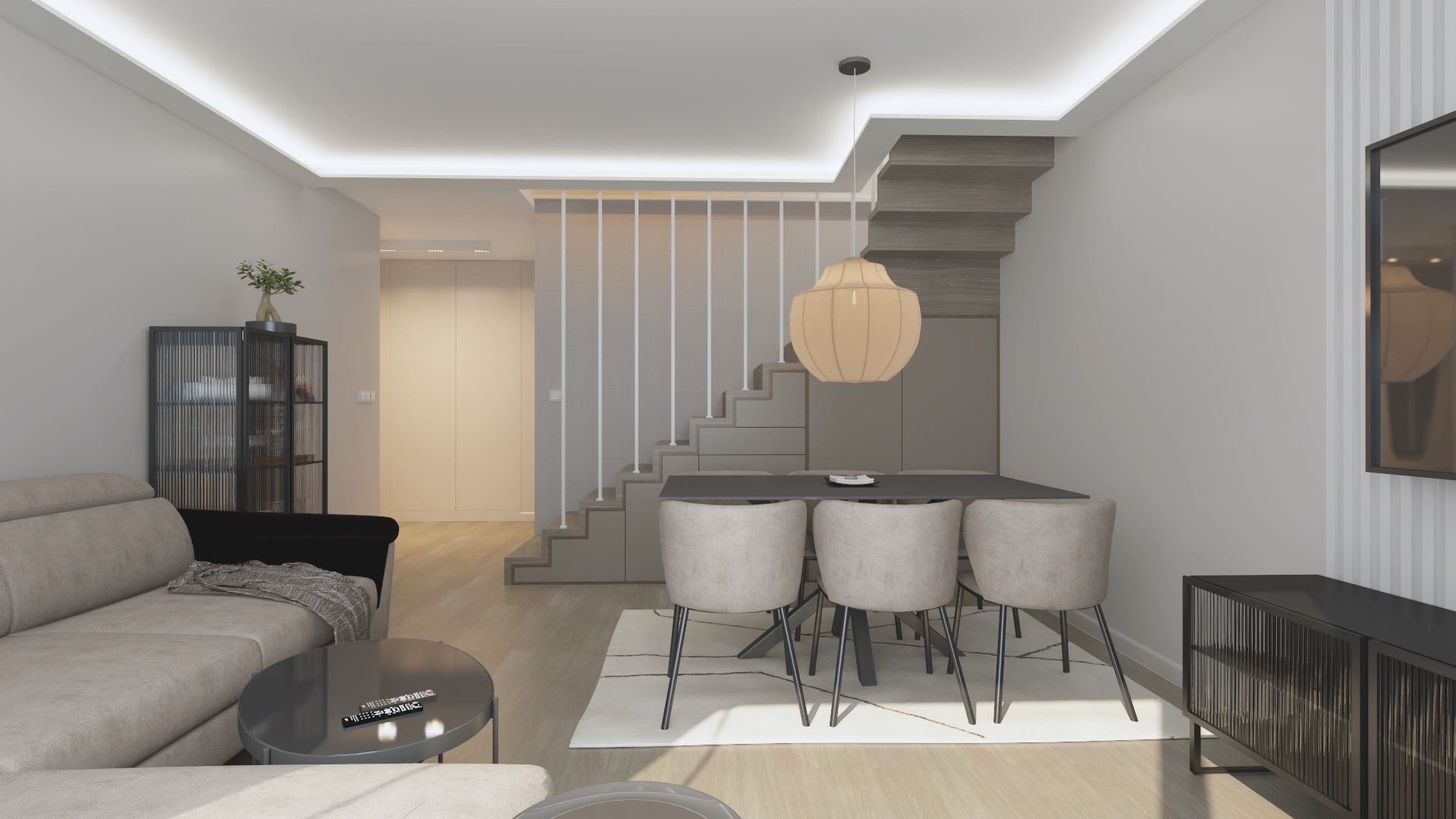 Nowoczesne wnętrze mieszkania z oświetleniem LED, beżową sofą, szarym stołem jadalnianym i schodami z jasnymi barierkami.