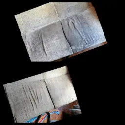 Fragment kanapy z widoczną różnicą w czystości tapicerki: górna część brudna, dolna po czyszczeniu, ujęcie ukośne.