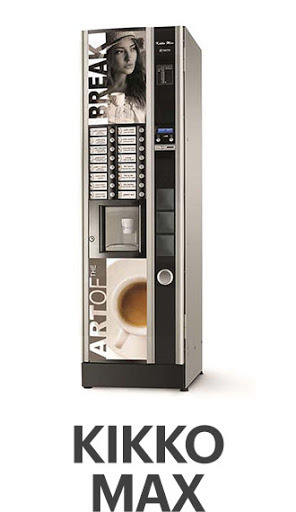 Automatyczny ekspres do kawy KIKKO MAX w kolorze srebrnym i czarnym, z panelem wyboru napojów i grafiką kobiety z filiżanką kawy, ustawiony na białym tle.