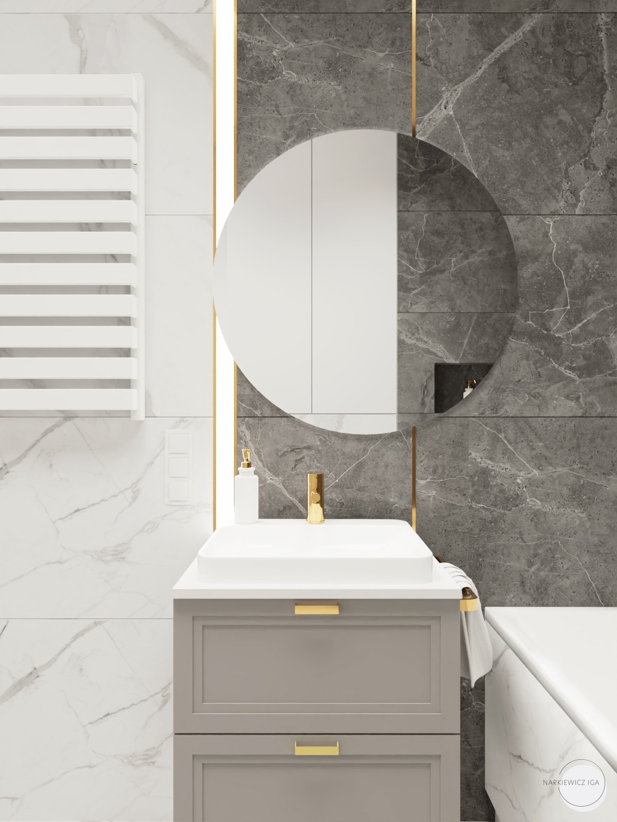 Nowoczesna łazienka z umywalką nablatową na szarej szafce, okrągłym lustrem z podświetleniem LED, marmurowymi płytkami w odcieniach szarości i bieli oraz złotymi akcentami.