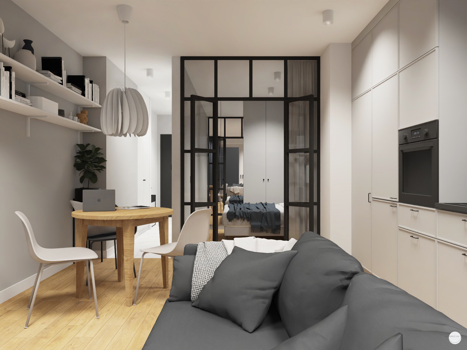 Wizualizacja kawalerki 30m2: salon z szarą sofą, okrągły drewniany stół z laptopem i krzesłami, przeszklona ściana oddzielająca sypialnię, zabudowa kuchenna z piekarnikiem.