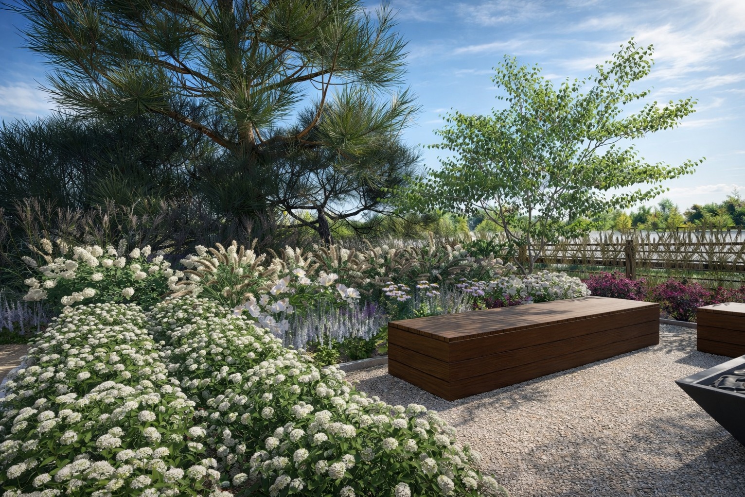 Wizualizacja ogrodu z drewnianą ławką, białymi kwiatami i ozdobnymi trawami. W tle widoczne drzewa i błękitne niebo z chmurami. Realistyczny render.