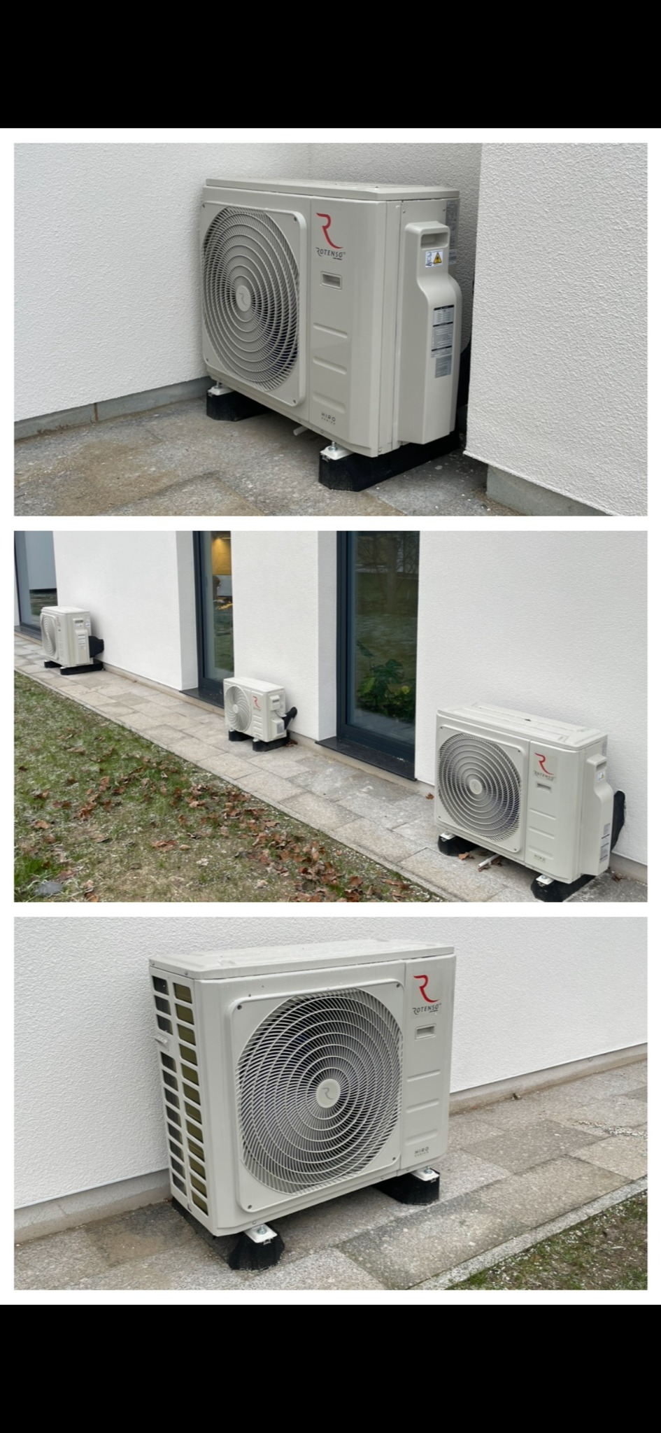 Zewnętrzna jednostka klimatyzacji Rotenso, zamontowana na czarnych podkładkach, Lidzbark Warmiński. Widok z boku, na tle białej ściany budynku.