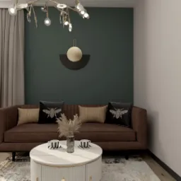 Nowoczesny salon z brązową sofą, poduszkami z motywem owada, okrągłym stolikiem kawowym z dwoma filiżankami i dekoracją ścienną w kształcie półkola z akcentem złota.