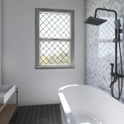 Nowoczesna łazienka z białą wanną, umywalką na drewnianym stelażu, oświetleniem w stylu industrialnym i ścianą pokrytą marmurową mozaiką w geometryczny wzór.