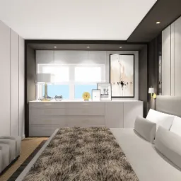 Nowoczesna sypialnia z szarą komodą pod oknem, dekoracjami, abstrakcyjnym obrazem i łóżkiem z futrzanym pledem.