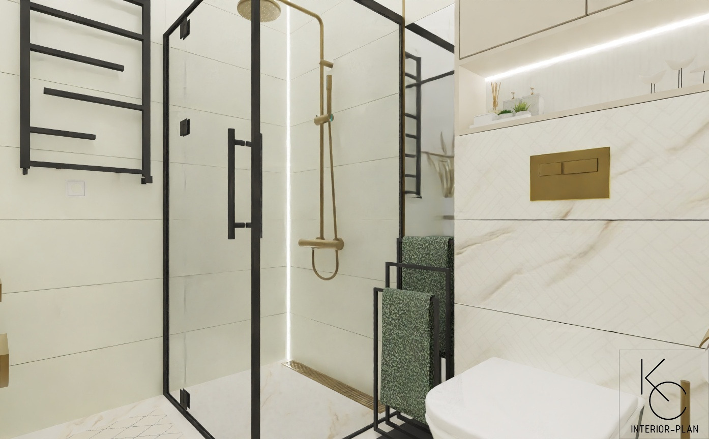 Nowoczesna łazienka z kabiną prysznicową typu walk-in z czarnymi ramami, złotą armaturą i grzejnikiem drabinkowym, białą ceramiką oraz marmurowymi płytkami.