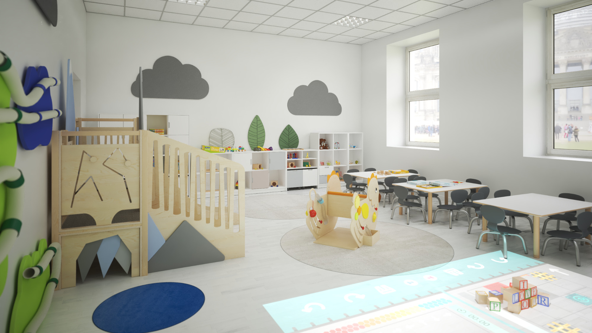 Jasne, przestronne wnętrze sali zabaw z drewnianą konstrukcją do wspinaczki, bujanym konikiem, stolikami i krzesłami, ozdobione motywami chmur i drzew na ścianach oraz interaktywną podłogą...