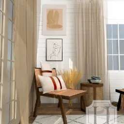 Wizualizacja wnętrza w Piła: Krzesło z rattanowym siedziskiem i poduszkami w odcieniach bieli i brązu, na tle białej ściany z obrazami i beżowych zasłon.