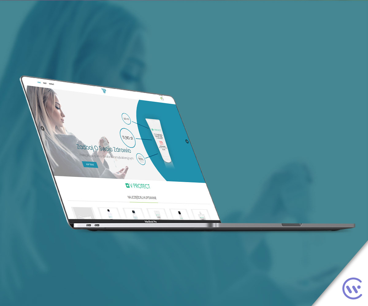 Laptop MacBook Pro wyświetlający stronę internetową z motywem zdrowia i higieny, z produktami antybakteryjnymi i informacją o promocji.