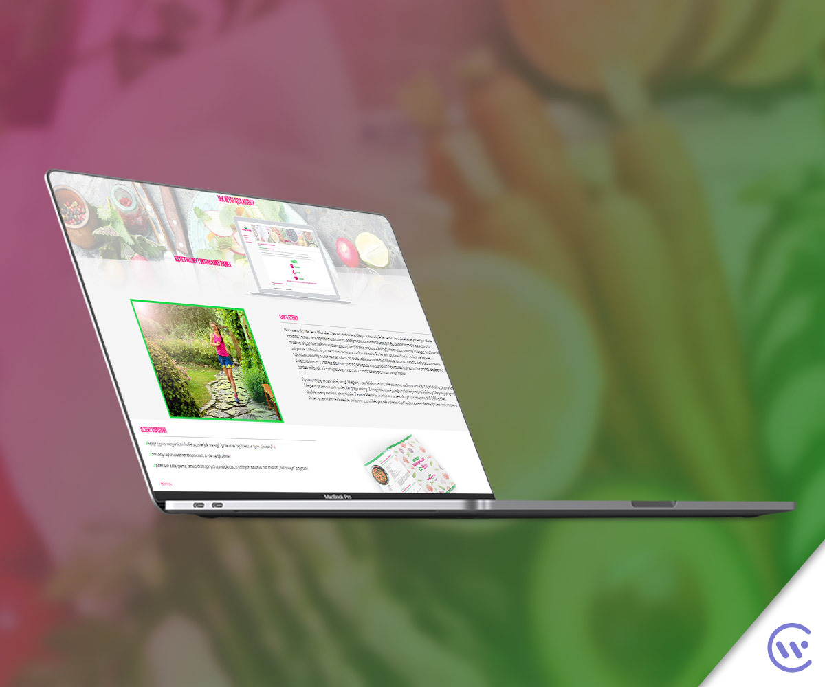 Ekran laptopa MacBook Pro wyświetlający stronę internetową z treściami o zdrowym stylu życia i bieganiu, z linkiem do kursów online.