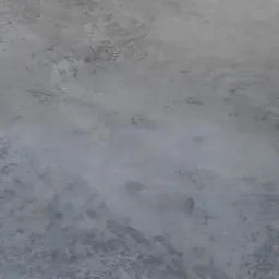 Szara, gładka powierzchnia z nieregularnymi wzorami i delikatną teksturą, przypominająca polerowany beton.