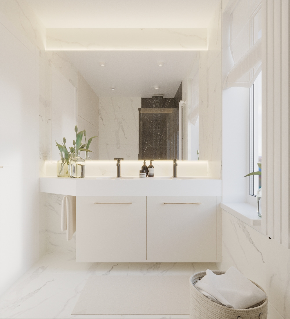 Jasna łazienka z podwójną umywalką nablatową, białymi szafkami z poziomymi uchwytami, marmurowymi ścianami i podświetlanym lustrem, w tle widoczny prysznic typu walk-in.
