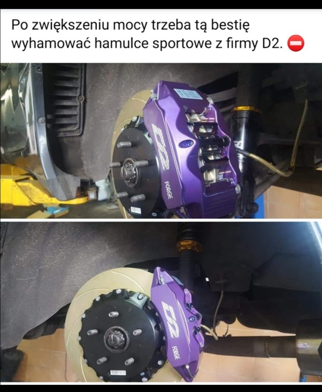 Sportowe hamulce D2 w kolorze fioletowym zamontowane na samochodzie, widoczne tarcze hamulcowe i zaciski. Zdjęcie z warsztatu samochodowego.