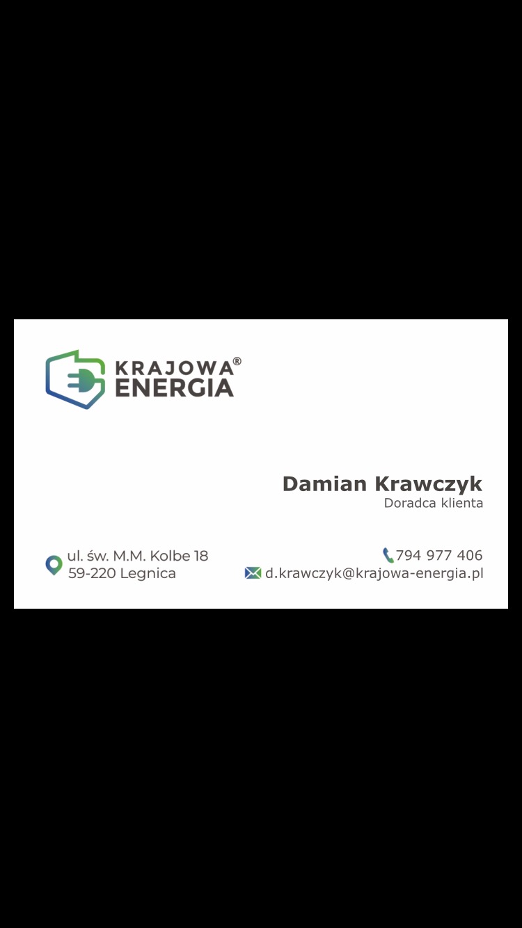 Wizytówka firmy Krajowa Energia, z logo w kolorach zieleni i błękitu, danymi kontaktowymi doradcy klienta Damiana Krawczyka oraz adresem w Legnicy.