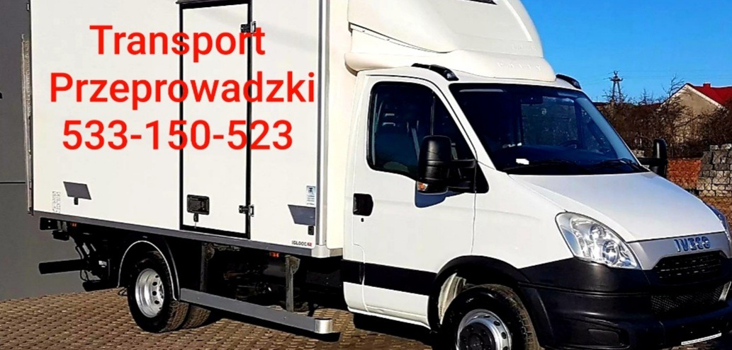 Biały samochód dostawczy Iveco z czerwonym napisem 'Transport Przeprowadzki 533-150-523' na boku kontenera, zaparkowany na zewnątrz.