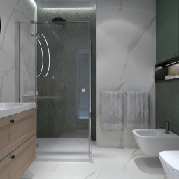 Conceptbe Pracownia Architektury Wnętrz - Wizualizacja łazienki z kabiną prysznicową typu walk-in z podświetleniem LED, umywalką z drewnianą szafką, bidetem i toaletą, wykończona płytkami w odcieniach bieli, szarości i zieleni.