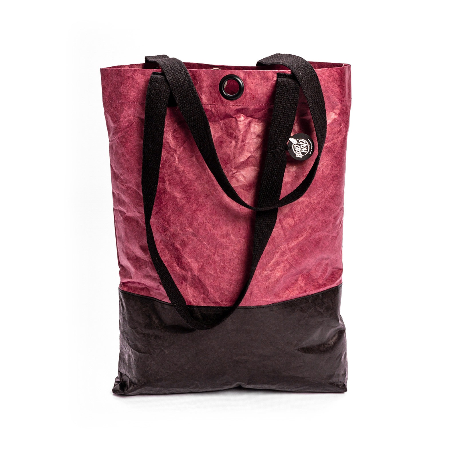 Torba shopper z marszczonego materiału w kolorze burgundowym i czarnym, z czarnymi uchwytami i okrągłym oczkiem wzmacniającym otwór.