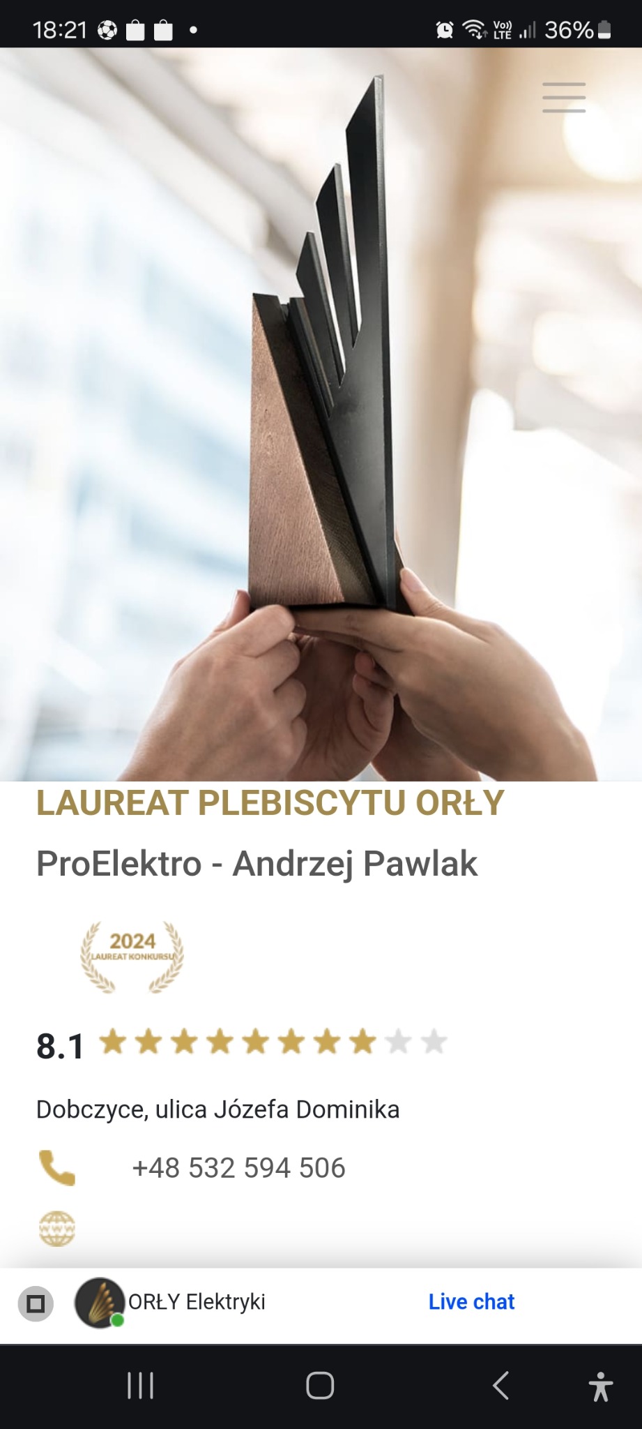 Zdjęcie ekranu telefonu z informacjami o firmie ProElektro - Andrzej Pawlak, laureacie plebiscytu Orły, z oceną 8.1, adresem w Dobczycach i numerem telefonu, prezentowane w aplikacji ORŁY Elektryki.
