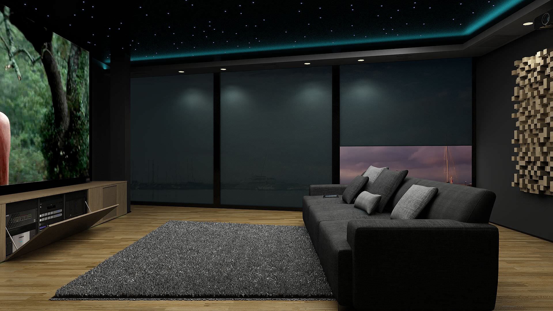 Salon kina domowego z sufitem w gwiazdy, szarą sofą, dużym ekranem i panelami akustycznymi na ścianie.