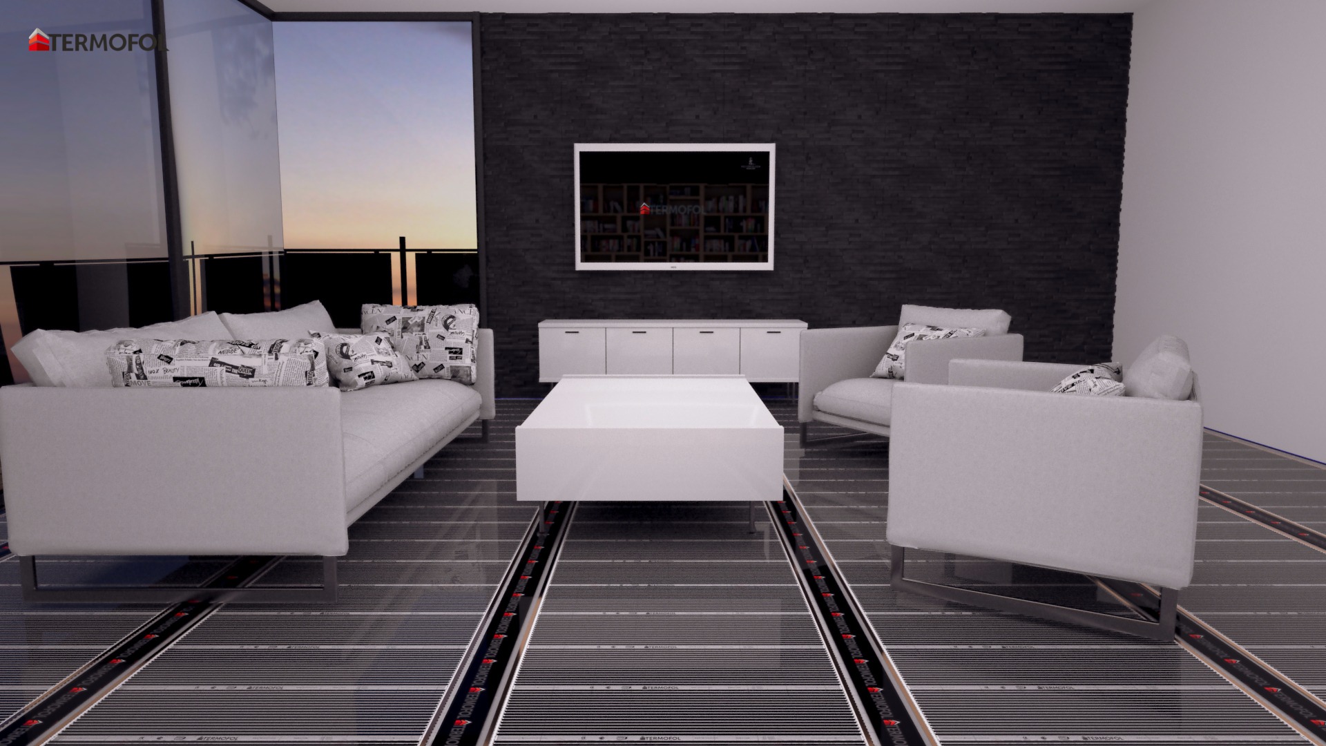 Salon z widocznym systemem ogrzewania podłogowego, maty grzewcze ułożone pod meblami, widok na taras i zachód słońca za oknem.