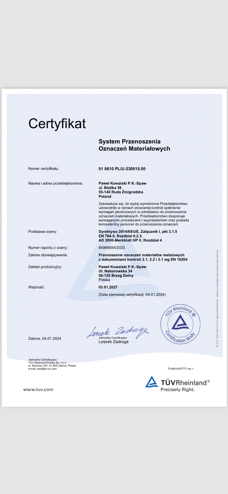 Skan certyfikatu Systemu Przenoszenia Oznaczeń Materiałowych wydany dla firmy Paweł Kowalski P.K.-Spaw przez TÜV Rheinland, datowany na 04.01.2024, z podpisem Leszka Zadrogi.