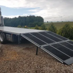 Zabudowa klapą Scania