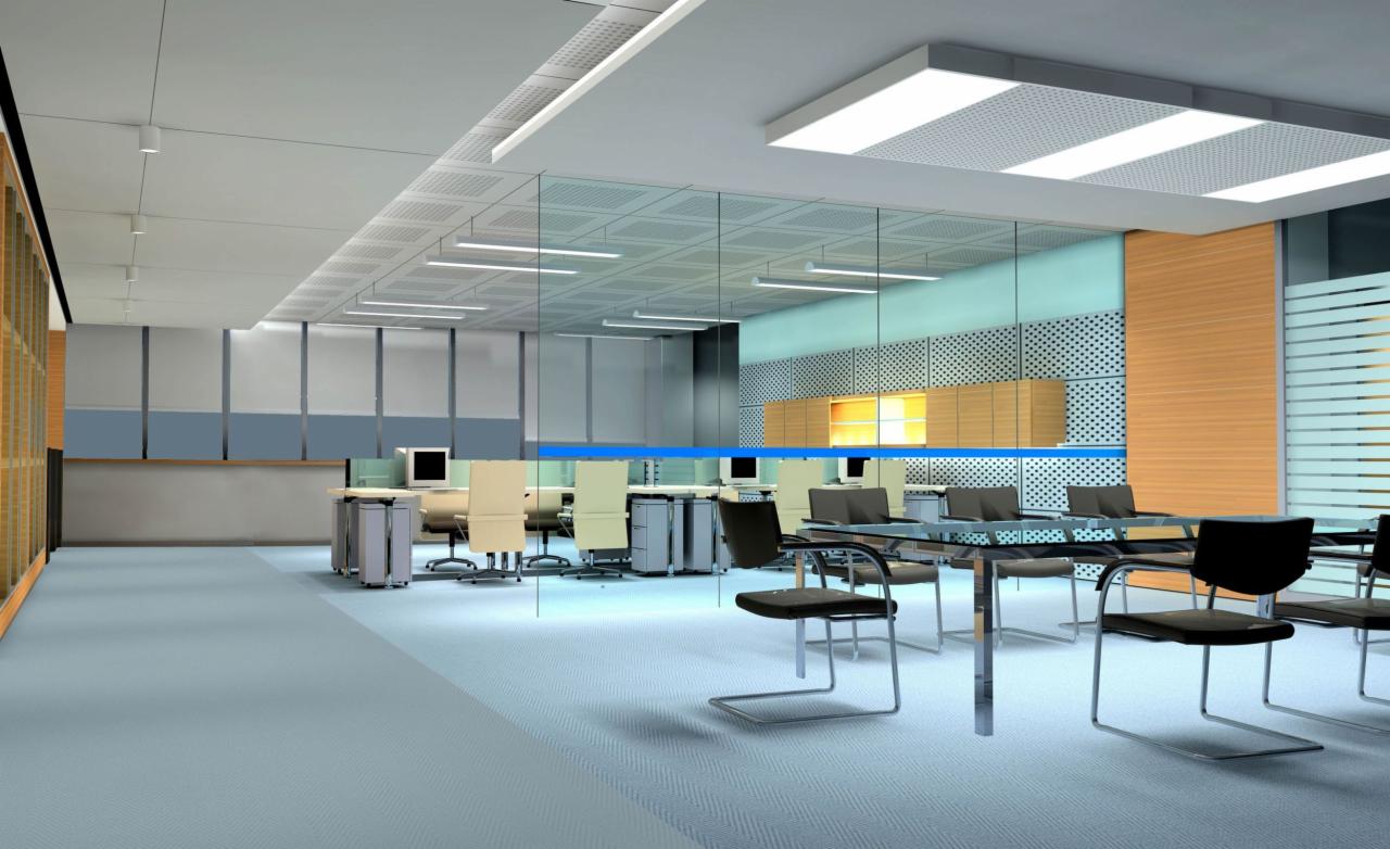 Jasna, błękitna wykładzina dywanowa w przestronnym biurze z szklanymi ścianami działowymi, widoczne biurka i krzesła biurowe.
