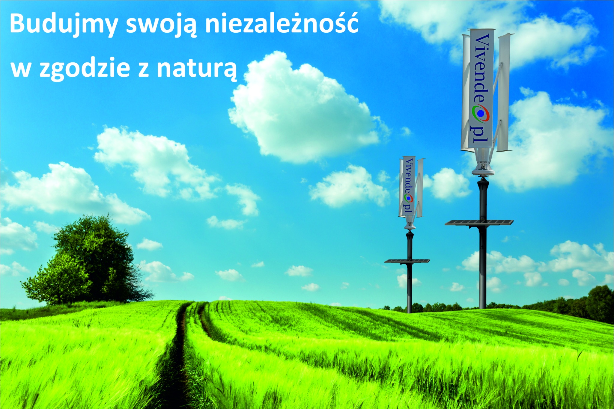 Dwie pionowe turbiny wiatrowe z logo Vivende.pl na tle błękitnego nieba i zielonego pola pszenicy, z hasłem 'Budujmy swoją niezależność w zgodzie z naturą' u góry.